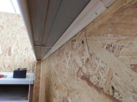 Warming and cladding with slabs of a balcony in an apartment house photo