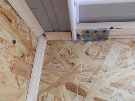 Warming and cladding with slabs of a balcony in an apartment house photo