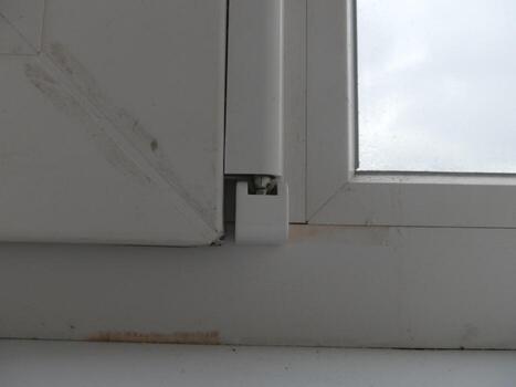 Warming and cladding with slabs of a balcony in an apartment house photo