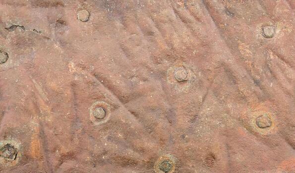 Steampunk Abstract background of old riveted copper sheet cladding. Grunge texture full frame photo