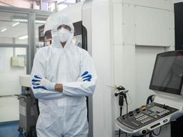 Researcher laboratory wear white uniform armcross test product medical health care treatment scientist indoor room hospital chemist job work career stand service engineer robot technology analysis photo