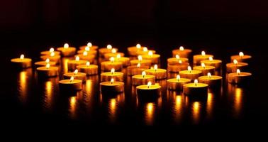 Many burning candles with shallow depth of field photo