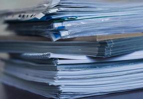 Large pile of magazine and books closeup photo