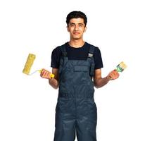 Repairman Arab nationality in the construction overalls on a white photo
