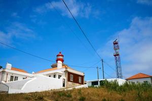 Red Lighthouse At Cape Cabo Da Roca, Portugal photo