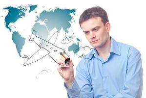 Businessman drawing plane photo