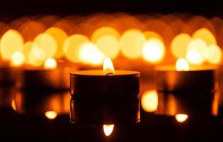 Burning candles with shallow depth of field photo