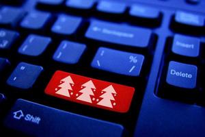 Christmas tree on Computer Key photo