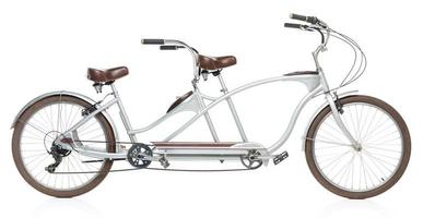 Retro styled tandem bicycle isolated on a white photo