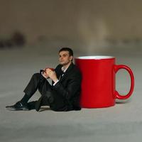 Businessman having tea photo