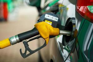 Car refueling on a petrol station photo