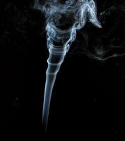 Abstract light smoke on a black background photo