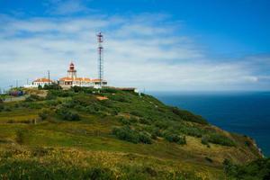 Red Lighthouse At Cape Cabo Da Roca, Portugal photo