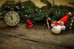 Vintage clock on christmas background photo