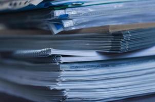 Large pile of magazine and books closeup photo