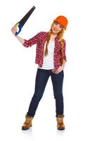 Young woman in helmet with a saw on a white background photo