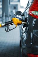 Car refueling on a petrol station photo