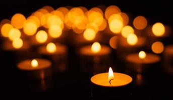 Burning candles with shallow depth of field photo