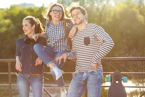 Smiling friends having fun outdoors photo