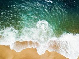 Top view of a deserted beach. The Portuguese coast of the Atlantic Ocean. photo