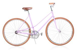 elegante De las mujeres rosado bicicleta aislado en blanco foto