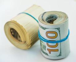 Roll of hundred dollars photo