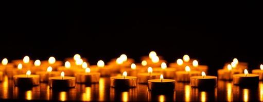 Many burning candles with shallow depth of field photo