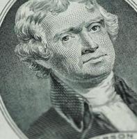 President Thomas Jefferson face on us two dollar bill closeup macro photo