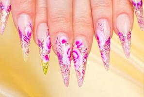 Manicure with fresh pink nail art photo