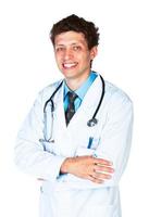 Portrait of a smiling male doctor on white photo