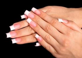 Beautiful hands with french manicure photo