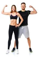Athletic man and woman after fitness exercise on the white photo