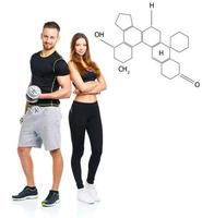 Athletic man and woman with dumbbells on the white with the chemical formula on background photo