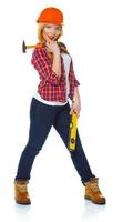 Young woman in helmet with the work tools on a white photo