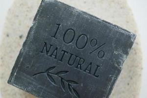 black color natural soap bar close up photo