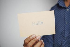 close up of hello text in blue color on a envelope photo