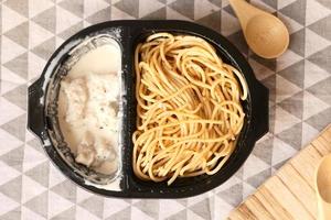 top view of pasta in a take away container photo