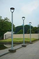 Some lampposts in the garden of the istiqlal mosque are silver color. Decorate the courtyard of the mosque photo