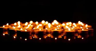 Burning candles with shallow depth of field photo