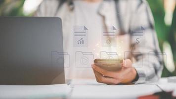 Businessman Audit online documents, quality assessment management With a checklist, business document evaluation process, market data report analysis and consulting, plan review process. photo