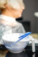 White hair dye in container photo