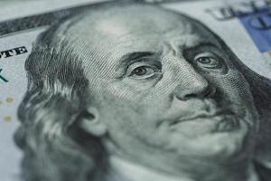 Benjamin Franklin's portrait on one hundred dollar bill photo