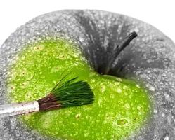 Green apple and brush. photo