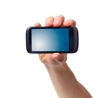 célula teléfono teléfono inteligente con pantalla táctil en masculino mano foto
