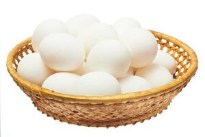 blanco huevos en el cesta foto