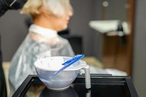 White hair dye in container photo