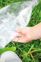 Plastic bag in little hands photo