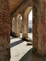 Sunlight through the windows of an old building photo