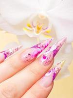 Manicure with fresh pink nail art photo