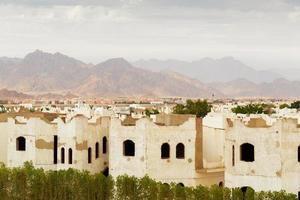 City landscape with low-grade houses in Egypt photo